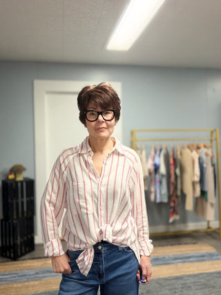The Perfect Line Top - Spanish Rose-Tops CasualThe Perfect Line Top - Spanish Rose | VerClare Boutique | Jenison MI -The Z Supply Perfect Line Top is a beautiful textured linen-rayon woven striped button-up shirt featuring a soft, drapey feel, a classic collared neckline, and a curved hemline for easy layering. It fits relaxed with an effortless, breezy silhouette — perfect for casual workdays, errands, travel, or everyday wear. Made from a lightweight, breathable linen-blend fabric, this piece adds polishe