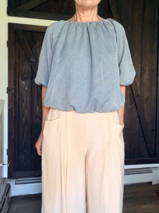 Gaia Pleat Wide-Leg Pants - Tan-BottomsGaia Pleat Wide-Leg Pants - Tan | VerClare Boutique | Jenison MI -Pleat Wide-Leg Pants are a beautiful lightweight woven cropped wide-leg pant featuring elegant pleat detailing, a comfortable pull-on waistband with elastic back, and functional side pockets. Free US shipping from VerClare Boutique.-VerClare Boutique