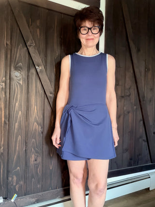 Valley Romper - Navy-Dresses & RompersValley Romper - Navy| VerClare Boutique | Jenison MI -Experience effortless style with the Navy Valley Romper by Thread & Supply. A flirty wrap skort design meets a sporty neckline for the perfect summer look! Free US shipping from VerClare Boutique on eligible orders.-VerClare Boutique