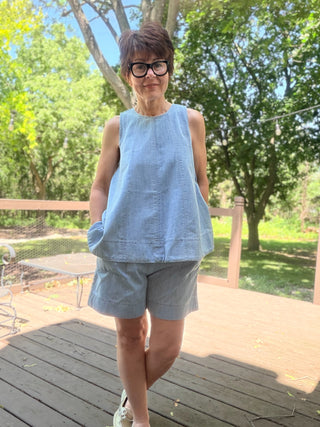 Gala Denim Tank Top - Lt Denim-Tops CasualCotierra Gala Denim Tank Top - Light Denim | VerClare Boutique-Shop the Cotierra Gala Denim Tank Top in Light Denim. Soft cotton-blend denim, scoop neck, pleated seaming, keyhole back, fit-and-flare silhouette. Sizes S–L.-VerClare Boutique
