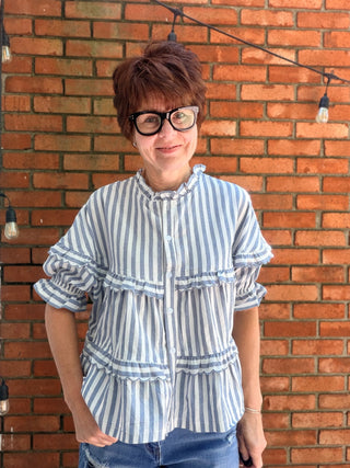 Nancy Stripe Tiered Blouse-TopsLovLov Nancy Stripe Tiered Blouse – Navy | VerClare Boutique-Shop the LovLov Nancy Stripe Tiered Blouse in navy — a delicate striped, tiered silhouette in a 50/50 cotton-poly blend. Feminine, lightweight, and effortlessly styled. Sizes S–XL.-VerClare Boutique