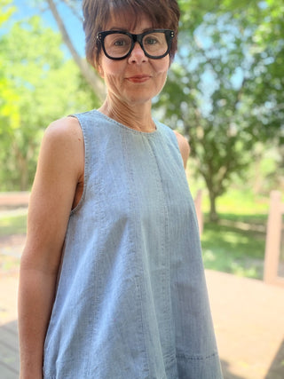 Gala Denim Tank Top - Lt Denim-Tops CasualCotierra Gala Denim Tank Top - Light Denim | VerClare Boutique-Shop the Cotierra Gala Denim Tank Top in Light Denim. Soft cotton-blend denim, scoop neck, pleated seaming, keyhole back, fit-and-flare silhouette. Sizes S–L.-VerClare Boutique