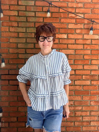 Nancy Stripe Tiered Blouse-TopsLovLov Nancy Stripe Tiered Blouse – Navy | VerClare Boutique-Shop the LovLov Nancy Stripe Tiered Blouse in navy — a delicate striped, tiered silhouette in a 50/50 cotton-poly blend. Feminine, lightweight, and effortlessly styled. Sizes S–XL.-VerClare Boutique