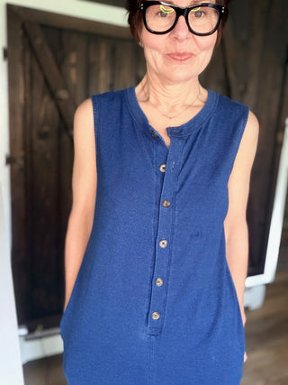 Fiona Jersey Denim Jumpsuit - Indigo-Dresses & RompersFiona Jersey Denim Jumpsuit - Indigo| VerClare Boutique | Jenison MI -The Z Supply Fiona Jersey Denim Jumpsuit is a beautiful cotton knit jersey sleeveless jumpsuit featuring a Henley-style button front, side seam pockets, and an easy relaxed silhouette. Free US shipping on eligible orders. -VerClare Boutique