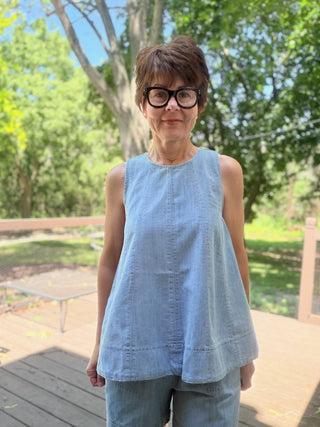Gala Denim Tank Top - Lt Denim-Tops CasualCotierra Gala Denim Tank Top - Light Denim | VerClare Boutique-Shop the Cotierra Gala Denim Tank Top in Light Denim. Soft cotton-blend denim, scoop neck, pleated seaming, keyhole back, fit-and-flare silhouette. Sizes S–L.-VerClare Boutique