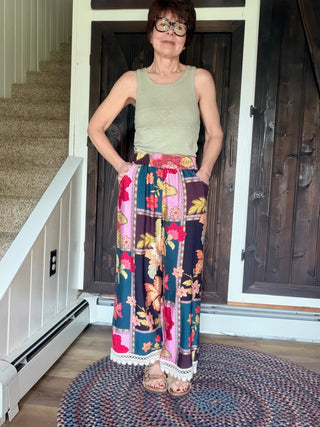 Celia Abstract Patchwork Print Pants - Pink Mix-BottomsCelia Abstract Patchwork Print Pants - Pink Mix | VerClare Boutique | Jenison MI -Abstract Patchwork Print Pants are a beautiful lightweight woven printed pant featuring a bold multi-color floral patchwork design, a comfortable elastic waistband, and delicate lace trim accents. Free US shipping from VerClare Boutique.-VerClare Boutique