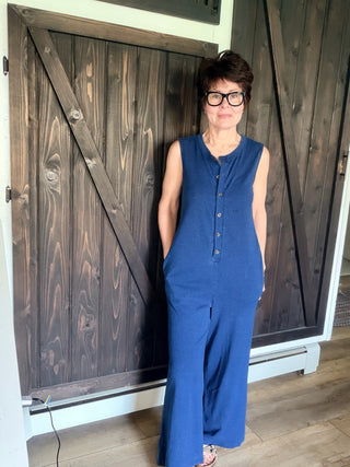 Fiona Jersey Denim Jumpsuit - Indigo-Dresses & RompersFiona Jersey Denim Jumpsuit - Indigo| VerClare Boutique | Jenison MI -The Z Supply Fiona Jersey Denim Jumpsuit is a beautiful cotton knit jersey sleeveless jumpsuit featuring a Henley-style button front, side seam pockets, and an easy relaxed silhouette. Free US shipping on eligible orders. -VerClare Boutique