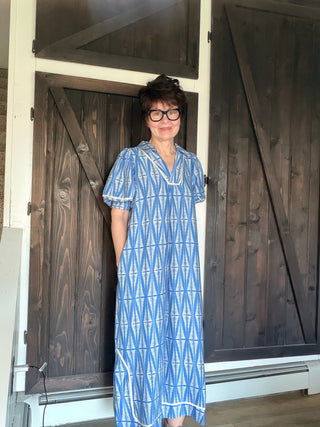 Cora Geometric Print Midi Dress - Cerulean-Dresses & RompersCora Geometric Print Midi Dress | VerClare Boutique | Jenison MI -Midi dress featuring a geometric leaf-inspired pattern, a flattering V-neckline, and short puff sleeves. Fits true to size with a relaxed flowy silhouette. Perfect for brunch, vacations, casual outings, or everyday wear. Free US shipping from VerClare Boutique.-VerClare Boutique