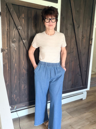 Danae Pinstripe Wide Leg Pants - Lt Denim-BottomsDanae Pinstripe Wide Leg Pants - Lt Denim | VerClare Boutique | Jenison MI -Pinstripe Wide Leg Pants are a beautiful lightweight cotton woven wide-leg pant featuring vertical pinstripe detailing, a comfortable elastic waistband, and a trendy raw frayed hem. Free US shipping from VerClare Boutique.-VerClare Boutique