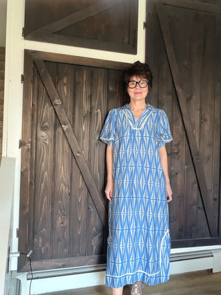 Cora Geometric Print Midi Dress - Cerulean-Dresses & RompersCora Geometric Print Midi Dress | VerClare Boutique | Jenison MI -Midi dress featuring a geometric leaf-inspired pattern, a flattering V-neckline, and short puff sleeves. Fits true to size with a relaxed flowy silhouette. Perfect for brunch, vacations, casual outings, or everyday wear. Free US shipping from VerClare Boutique.-VerClare Boutique