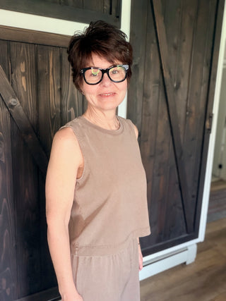 Sloane Jersey Muscle Tank - Perfectly Taupe-Tops Basic SolidSloane Jersey Muscle Tank - Perfectly Taupe | VerClare Boutique | Jenison MI -The Z Supply Sloane Jersey Muscle Tank is a beautiful cotton jersey knit sleeveless muscle tank featuring a classic crew neckline, wide straps, and a relaxed, easy silhouette. It fits true to size with a laid-back drape — perfect for everyday wear, layering, travel, or casual outings. Made from a soft 100% cotton fabric with a mineral wash finish, this piece delivers a li