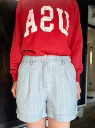 Junia Shorts - Blue Haze Wash-BottomsJunia Shorts - Blue Haze Wash | VerClare Boutique | Jenison MI -Discover the Junia High-Rise Shorts in Blue Haze. Featuring a vintage pinstripe, breathable fabric, and tailored pleats for the ultimate summer-ready look. Free US shipping on all eligible orders.-VerClare Boutique