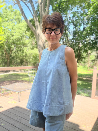 Gala Denim Tank Top - Lt Denim-Tops CasualCotierra Gala Denim Tank Top - Light Denim | VerClare Boutique-Shop the Cotierra Gala Denim Tank Top in Light Denim. Soft cotton-blend denim, scoop neck, pleated seaming, keyhole back, fit-and-flare silhouette. Sizes S–L.-VerClare Boutique