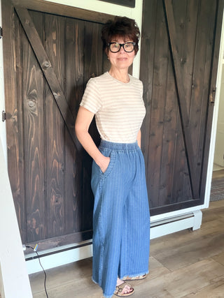 Danae Pinstripe Wide Leg Pants - Lt Denim-BottomsDanae Pinstripe Wide Leg Pants - Lt Denim | VerClare Boutique | Jenison MI -Pinstripe Wide Leg Pants are a beautiful lightweight cotton woven wide-leg pant featuring vertical pinstripe detailing, a comfortable elastic waistband, and a trendy raw frayed hem. Free US shipping from VerClare Boutique.-VerClare Boutique