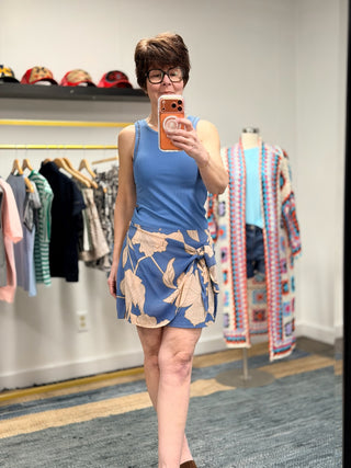 Lorna Bloom Floral Mini Skirt - Lake Blue-BottomsLorna Bloom Floral Mini Skirt- Lake Blue | VerClare Boutique | Jenison MI -Z Supply Lorna Bloom Floral Mini Skirt is a beautiful textured voile woven mini skirt featuring an allover floral print, a flattering wrap-inspired front, and a fixed tie detail at the waist. Free US shipping on eligible orders. Chenoa, Illinois-VerClare Boutique