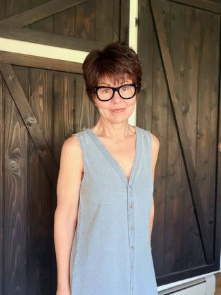 Solace Denim Mini Dress - Ocean Air Indigo-Dresses & RompersSolace Denim Mini Dress - Ocean Air Indigo | VerClare Boutique | Jenison MI -The Z Supply Solace Denim Mini Dress is a beautiful cotton knit jersey sleeveless mini dress featuring a flattering V-neckline, a button-front design, and an easy, everyday silhouette. Free US shipping on eligible orders. -VerClare Boutique