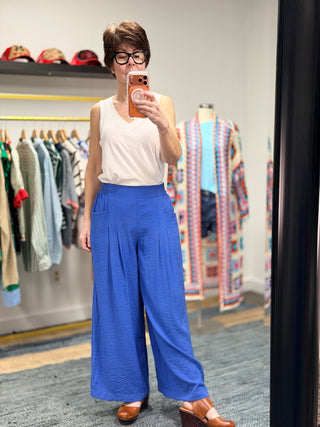 Gaia Pleat Wide-Leg Pants - Blue-BottomsGaia Pleat Wide-Leg Pants - Blue | VerClare Boutique | Jenison MI -Pleat Wide-Leg Pants are a beautiful lightweight woven cropped wide-leg pant featuring elegant pleat detailing, a comfortable pull-on waistband with elastic back, and functional side pockets. Free US shipping from VerClare Boutique.-VerClare Boutique