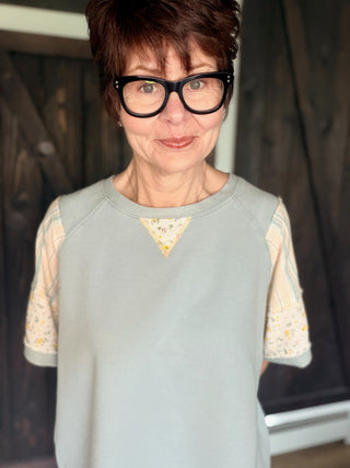Daria French Terry Top - Lt. Blue-Tops CasualDaria French Terri Top - Lt. Blue | VerClare Boutique | Jenison MI -This French Terry Top is a beautiful soft mineral-washed French terry short-sleeve top featuring mixed print panel detailing, a classic round neckline, and an easy everyday silhouette. Free US shipping from VerClare Boutique.-VerClare Boutique