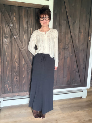 Idris Maxi Skirt - Black-BottomsIdris Maxi Skirt - Black | VerClare Boutique | Jenison MI -The Z Supply Idris Maxi Skirt is a beautiful soft knit maxi skirt featuring a flattering high-rise fit, an easy pull-on waistband, and a sleek, flowy silhouette. Free US shipping on eligible orders. -VerClare Boutique