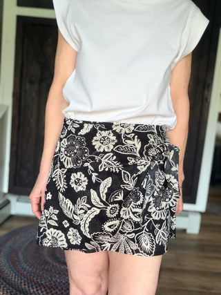 Lorna Luz Floral Mini Skirt - Black-BottomsZ Supply Lorna Luz Floral Mini Skirt - Black | VerClare Boutique-Z Supply Lorna Luz Floral Mini Skirt in Black. Wrap-style, high-rise mini in lightweight rayon-cotton voile. True to size. Shop at VerClare Boutique.-VerClare Boutique