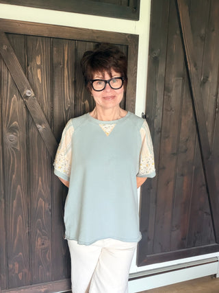 Daria French Terry Top - Lt. Blue-Tops CasualDaria French Terri Top - Lt. Blue | VerClare Boutique | Jenison MI -This French Terry Top is a beautiful soft mineral-washed French terry short-sleeve top featuring mixed print panel detailing, a classic round neckline, and an easy everyday silhouette. Free US shipping from VerClare Boutique.-VerClare Boutique