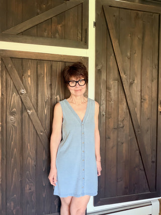Solace Denim Mini Dress - Ocean Air Indigo-Dresses & RompersSolace Denim Mini Dress - Ocean Air Indigo | VerClare Boutique | Jenison MI -The Z Supply Solace Denim Mini Dress is a beautiful cotton knit jersey sleeveless mini dress featuring a flattering V-neckline, a button-front design, and an easy, everyday silhouette. Free US shipping on eligible orders. -VerClare Boutique