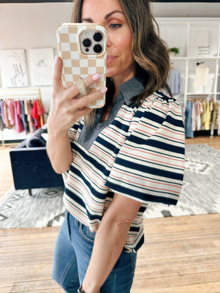 Cressida Collared V-Neck Striped Top - Navy-Tops CasualCressida Collard V-Neck Striped Top | VerClare Boutique | Jenison MI -V-Neck Striped Top is a beautiful ribbed knit stripe fabric short-sleeve top featuring a collared V-neckline, short bubble sleeves, and a thick placket detail with contrast fabric accents. Free US shipping from VerClare Boutique.-VerClare Boutique