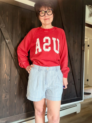 Junia Shorts - Blue Haze Wash-BottomsJunia Shorts - Blue Haze Wash | VerClare Boutique | Jenison MI -Discover the Junia High-Rise Shorts in Blue Haze. Featuring a vintage pinstripe, breathable fabric, and tailored pleats for the ultimate summer-ready look. Free US shipping on all eligible orders.-VerClare Boutique