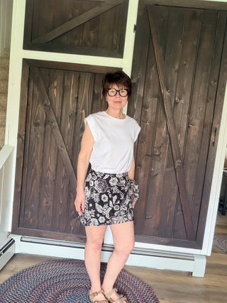 Lorna Luz Floral Mini Skirt - Black-BottomsZ Supply Lorna Luz Floral Mini Skirt - Black | VerClare Boutique-Z Supply Lorna Luz Floral Mini Skirt in Black. Wrap-style, high-rise mini in lightweight rayon-cotton voile. True to size. Shop at VerClare Boutique.-VerClare Boutique