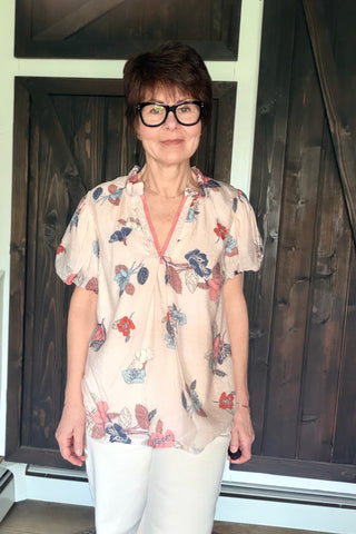 Elia Floral Puff Sleeve Blouse - Lt. Pink-Tops CasualElia Floral Puff Sleeve Blouse - Lt. Pink | VerClare Boutique | Jenison MI -Beautiful lightweight woven floral blouse featuring short puff sleeves, a V-notch neckline with lace contrast trim, and a soft feminine silhouette. Free US shipping from VerClare Boutique.-VerClare Boutique