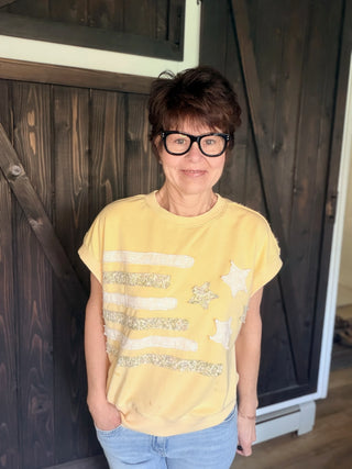 Stars and Stripes Patch Washed Sleeveless Top - Butter Yellow-Tops CasualStars and Stripes Patch Washed Sleeveless Top - Butter Yellow | VerClare Boutique-Shop the Mittoshop Stars and Stripes Patch Washed Sleeveless Top in Butter Yellow at VerClare Boutique. Oversized French terry tank with patchwork detail. Free US shipping on eligible orders.-VerClare Boutique