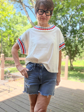 Cabana Stripe Tee-TopsLovLov Cabana Stripe Tee – Oversized White Cotton | VerClare Boutique-Shop the LovLov Cabana Stripe Tee — oversized 100% cotton white tee with contrast stripe trim at the neck and sleeves. Sizes S–XL. Free US shipping on eligible orders.-VerClare Boutique
