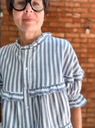 Nancy Stripe Tiered Blouse-TopsLovLov Nancy Stripe Tiered Blouse – Navy | VerClare Boutique-Shop the LovLov Nancy Stripe Tiered Blouse in navy — a delicate striped, tiered silhouette in a 50/50 cotton-poly blend. Feminine, lightweight, and effortlessly styled. Sizes S–XL.-VerClare Boutique