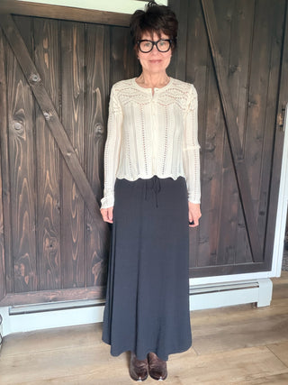 Idris Maxi Skirt - Black-BottomsIdris Maxi Skirt - Black | VerClare Boutique | Jenison MI -The Z Supply Idris Maxi Skirt is a beautiful soft knit maxi skirt featuring a flattering high-rise fit, an easy pull-on waistband, and a sleek, flowy silhouette. Free US shipping on eligible orders. -VerClare Boutique