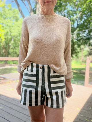 Helia Mineral Striped Shorts - Matcha Foam-BottomsEE:SOME Helia Mineral Striped Shorts - Matcha Foam | VerClare Boutique-Shop the EE:SOME Helia Mineral Striped Shorts in Matcha Foam. Mineral-washed cotton knit, stripe detail, stretch fabric, relaxed everyday silhouette. Sizes S–L.-VerClare Boutique