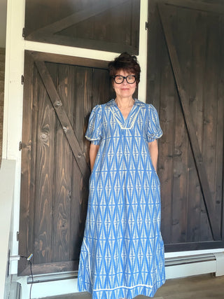 Cora Geometric Print Midi Dress - Cerulean-Dresses & RompersCora Geometric Print Midi Dress | VerClare Boutique | Jenison MI -Midi dress featuring a geometric leaf-inspired pattern, a flattering V-neckline, and short puff sleeves. Fits true to size with a relaxed flowy silhouette. Perfect for brunch, vacations, casual outings, or everyday wear. Free US shipping from VerClare Boutique.-VerClare Boutique