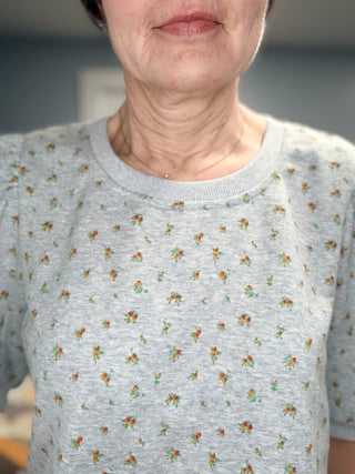 Ayla Floral Puff Sleeve Terry Top – H Grey-Tops CasualAyla Floral Puff Sleeve Terry Top - H Grey| VerClare Boutique | Jenison MI -Floral Puff Sleeve Terry Top is a beautiful cotton-blend French terry knit short-sleeve top featuring a soft floral print, feminine puff sleeves, and a relaxed everyday silhouette. US shipping on eligible orders-VerClare Boutique