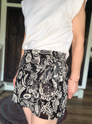 Lorna Luz Floral Mini Skirt - Black-BottomsZ Supply Lorna Luz Floral Mini Skirt - Black | VerClare Boutique-Z Supply Lorna Luz Floral Mini Skirt in Black. Wrap-style, high-rise mini in lightweight rayon-cotton voile. True to size. Shop at VerClare Boutique.-VerClare Boutique