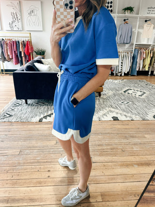 Rylan Knit Mini Skirt - Cobalt Blue-BottomsRylan Knit Mini Skirt - Cobalt Blue | VerClare Boutique | Jenison MI -Soft stretch knit mini skirt featuring contrast hem detailing, a comfortable elastic waistband, and functional pockets. Free US shipping from VerClare Boutique.-VerClare Boutique