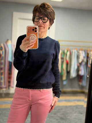 Ophelia Navy Cotton Sweater-SweatersOphelia Navy Cotton Sweater | VerClare Boutique | Jenison MI -Cotton Sweater is a beautiful soft long sleeve 100% cotton featuring white contrast switching around neck, wrist and waist and ruffle shoulder detail. Free US shipping from VerClare Boutique.-VerClare Boutique