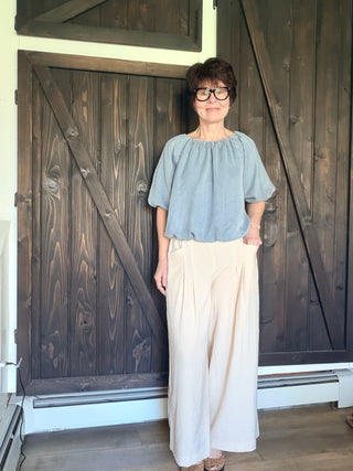 Gaia Pleat Wide-Leg Pants - Tan-BottomsGaia Pleat Wide-Leg Pants - Tan | VerClare Boutique | Jenison MI -Pleat Wide-Leg Pants are a beautiful lightweight woven cropped wide-leg pant featuring elegant pleat detailing, a comfortable pull-on waistband with elastic back, and functional side pockets. Free US shipping from VerClare Boutique.-VerClare Boutique