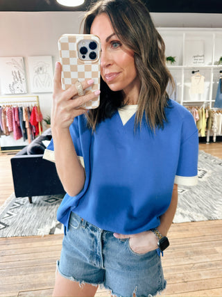 Rylan Short Sleeve Knit Top - Cobalt Blue-Tops Basic SolidRylan Knit Top - Cobalt Blue | VerClare Boutique | Jenison MI-Soft stretch knit short-sleeve top featuring contrast band detailing, a classic crew neckline, and an easy, flattering silhouette. Free US shipping from VerClare Boutique.-VerClare Boutique