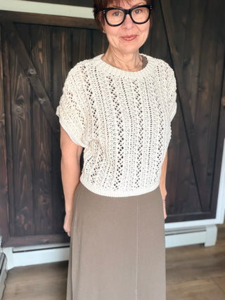 Ballast Crochet Top - White-Tops CasualBallast Crochet Top - White | VerClare Boutique | Jenison MI -The Z Supply Ballast Crochet Top is a beautiful rope yarn crochet knit short-sleeve top featuring all-over crochet detailing, a classic crew neckline, and a lightweight, textured feel. It fits true to size with a relaxed, flattering silhouette — perfect for layering, beach days, vacations, or everyday wear. Made from a soft cotton-blend rope yarn, this piece adds effortless texture while keeping your look br