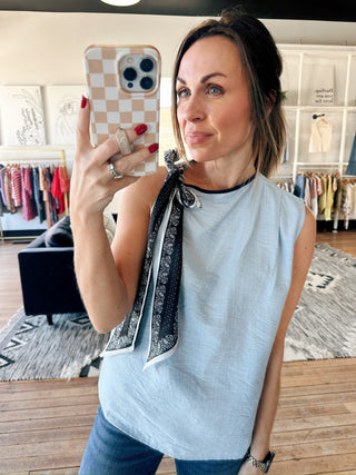 Karina Vintage Muse Scarf-Tie Blouse - Blue-Tops CasualKarina Vintage Muse Scarf-Tie Blouse | VerClare Boutique | Jenison MI -Vintage Muse Scarf-Tie Blouse is a beautiful lightweight woven scarf-tie blouse featuring a vintage-inspired silhouette, a feminine neck scarf tie, and an effortlessly polished drape. Free US shipping from VerClare Boutique.-VerClare Boutique