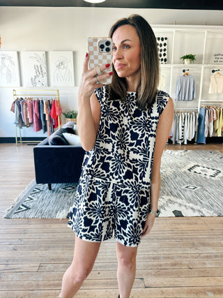 Zarina Tropical Print Sleeveless Top - Navy/Ivory-Tops Basic PrintZarina Tropical Print Sleeveless Top - Navy/Ivory | VerClare Boutique | Jenison MI -Lightweight woven summer blouse featuring a tropical-inspired print, a classic crew neckline, and an effortless, breezy silhouette. Free US shipping from VerClare Boutique.-VerClare Boutique