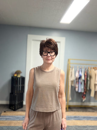Sloane Jersey Muscle Tank - Perfectly Taupe-Tops Basic SolidSloane Jersey Muscle Tank - Perfectly Taupe | VerClare Boutique | Jenison MI -The Z Supply Sloane Jersey Muscle Tank is a beautiful cotton jersey knit sleeveless muscle tank featuring a classic crew neckline, wide straps, and a relaxed, easy silhouette. It fits true to size with a laid-back drape — perfect for everyday wear, layering, travel, or casual outings. Made from a soft 100% cotton fabric with a mineral wash finish, this piece delivers a li