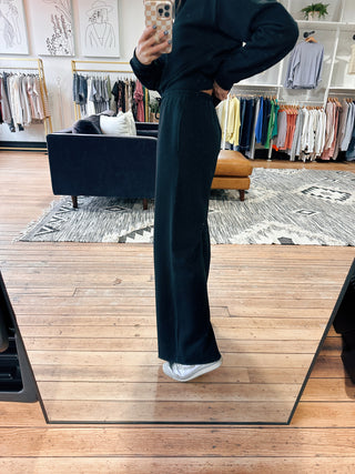 Z Supply Downtown Wide Leg Sweatpant - Black-BottomsZ Supply Downtown Wide Leg Sweatpant – Black | VerClare Boutique | Chenoa, IL-Z Supply Downtown wide leg sweatpant in black with a relaxed, comfy fit and soft feel. Elevated loungewear perfect for everyday wear. Free US shipping from VerClare Boutique.-VerClare Boutique