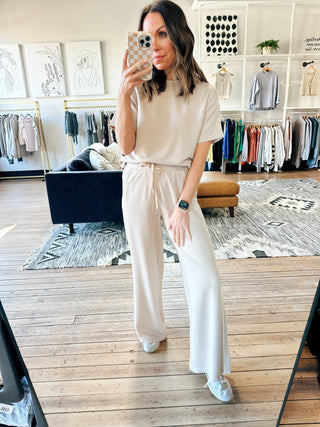 Harbor Modal Top - Parchment-Tops Basic SolidHarper Two Piece Set-Blush | VerClare Boutique | Chenoa, IL-Women's Blush Lounge Set. Available in sizes: S, M, L. 60% Cotton, 40% Polyester. Free US shipping on all eligible orders. Located in Chenoa, Illinois.-VerClare Boutique