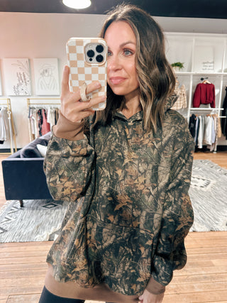 Bayou Camo Fleece Hoodie-Jackets & KimonosWomen's Hoodie | VerClare Boutique-Bayou Camo Fleece Hoodie: Sizes: S - L. Color: Dark Camo. Fabric: 55% Cotton 45% Polyester. Free Shipping on $100+ orders with VerClare Boutique in Chenoa, IL. -VerClare Boutique