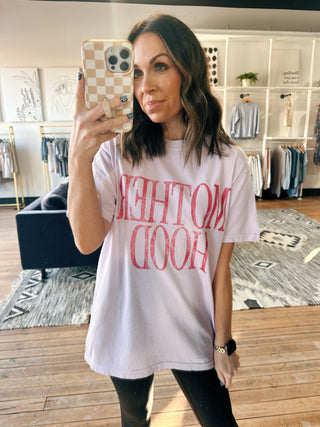 Motherhood Graphic Tee - Lilac/Pink-Tops Basic PrintMotherhood Graphic Tee – Lilac/Pink | VerClare Boutique | Chenoa, IL-Shop the Motherhood Graphic Tee in lilac and pink at VerClare Boutique. A soft, feel-good graphic tee that’s easy to style for everyday wear.-VerClare Boutique